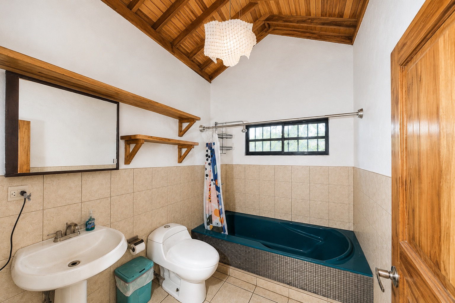 Bathroom with a vaulted wood ceiling