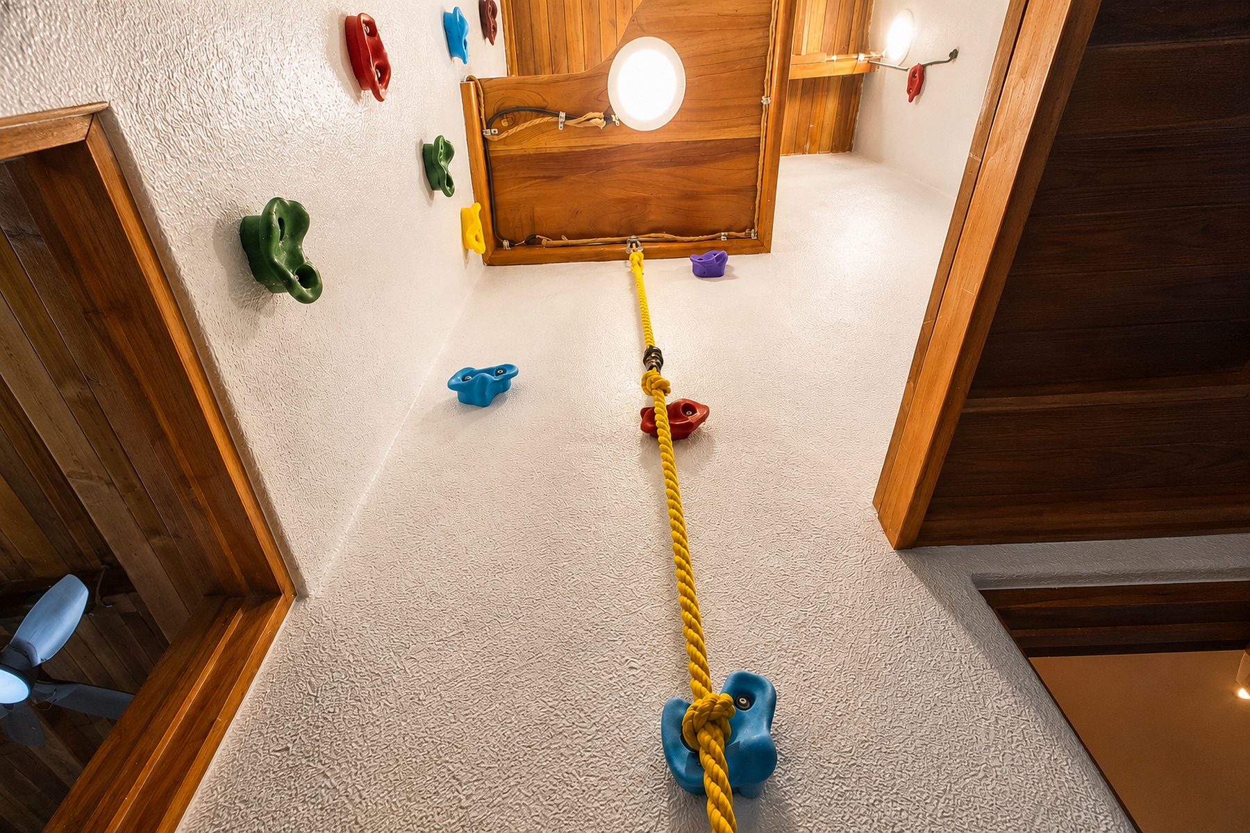 Indoor climbing wall and rope feature