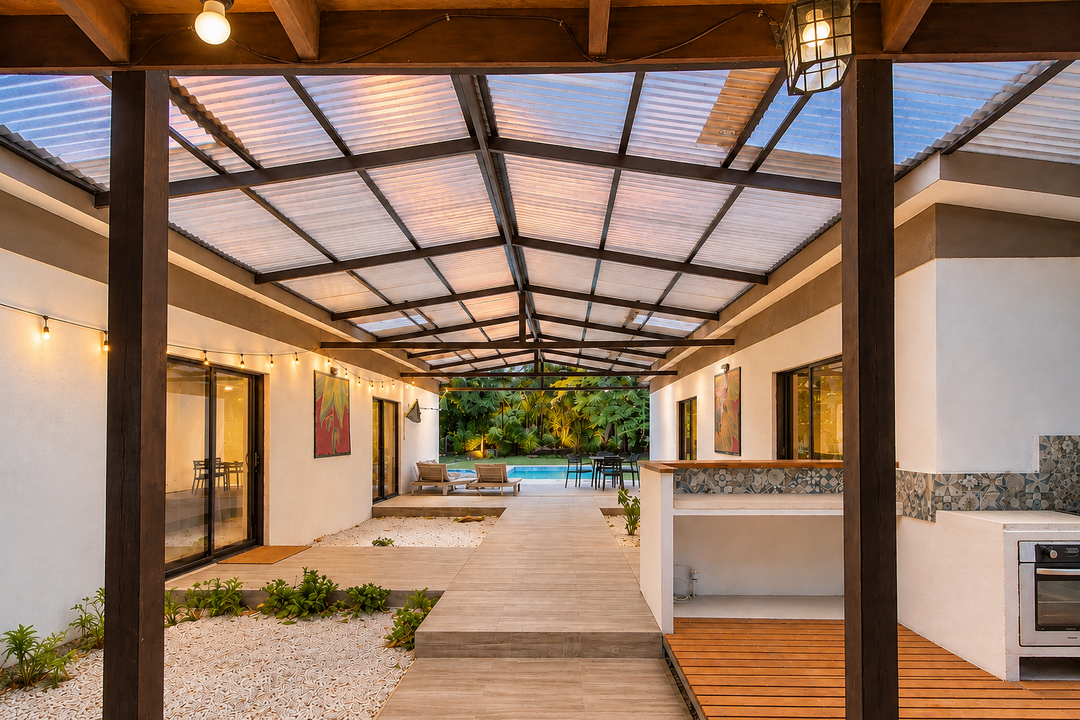 Covered courtyard opening onto the pool